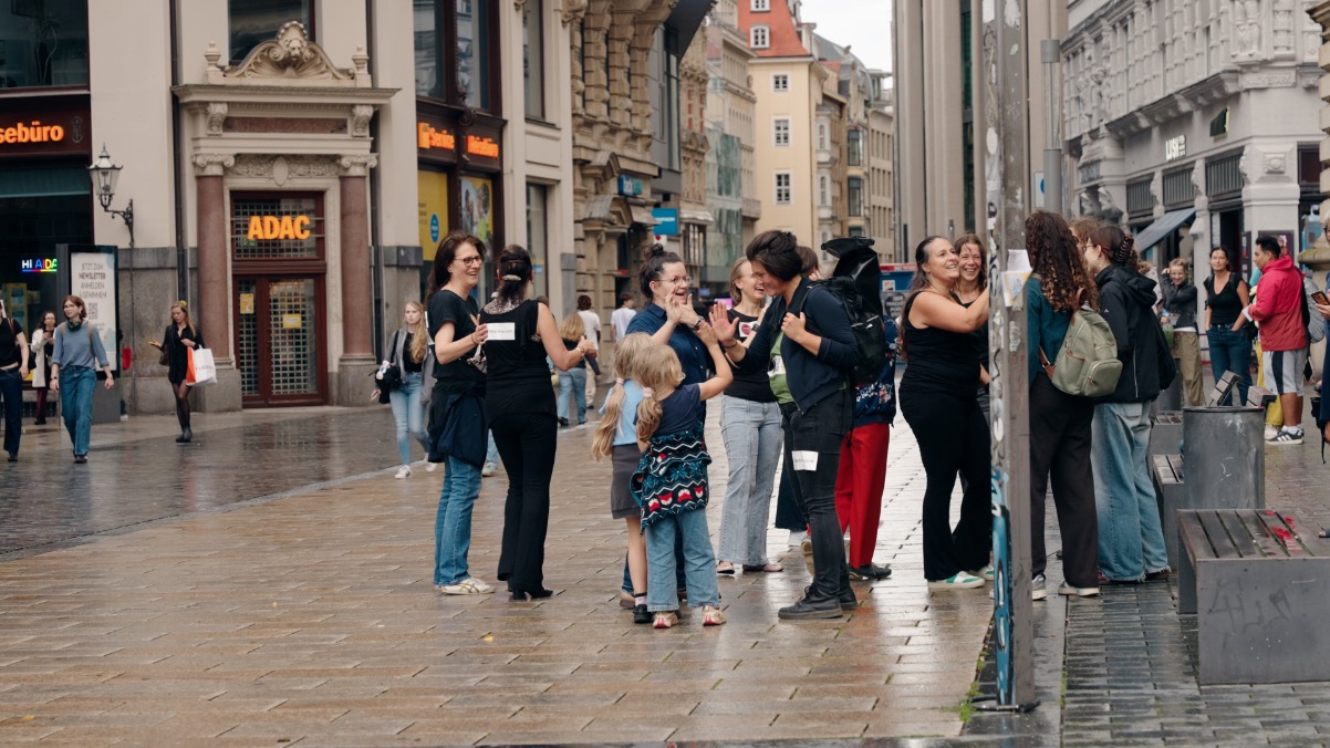 The Follow the Beat group meeting passers-by in Leipzig city centre